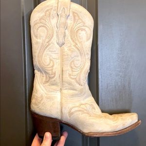 Cowboy boots — white leather.